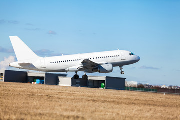 Passenger airliner taking off at an airport