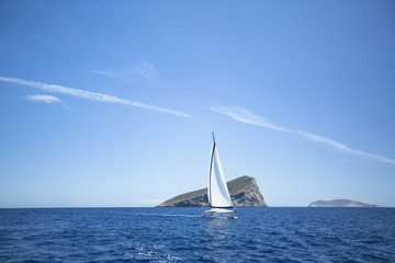 Fototapeta na wymiar Sailing ship yachts with white sails.