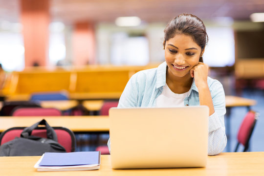 Female Indian University Student Using Laptop