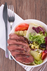 vegetable salad and red meat