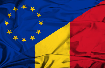 Waving flag of Romania and EU