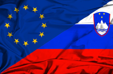 Waving flag of Slovenia and EU