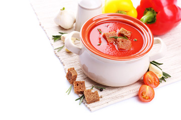 Tasty tomato soup and vegetables, isolated on white