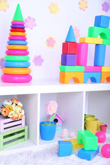 Colorful plastic toys in children room