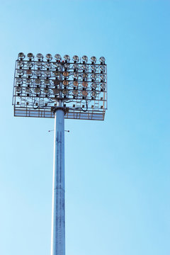 Stadium light pole in the sky.