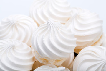 French vanilla meringue cookies on white background
