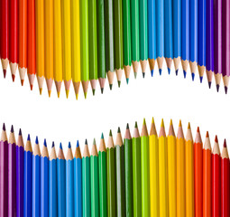 Two mirrored waves of colorful pencils