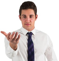 Businessman standing with hand out