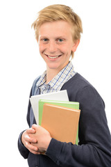 Happy teenage student holding books