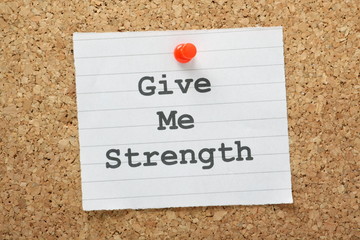 The phrase Give Me Strength on a cork notice board