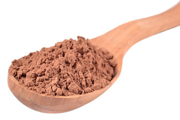 Fototapeta na wymiar Cocoa powder in a wooden spoon on a white