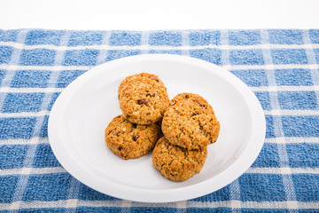 Fresh baked oatmeal cookies with raisins, cranberries and nuts
