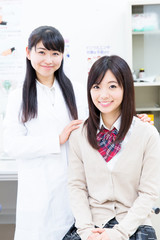Obraz premium two asian women in clinic