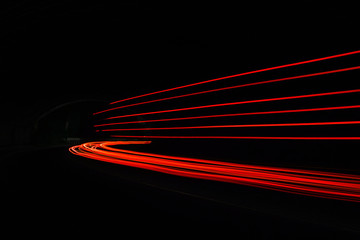 Car light trails in the tunnel.