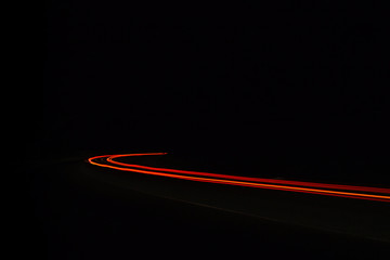Car light trails in the tunnel.