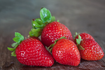 Strawberries on wooden table