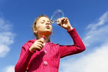 Child starting soap bubbles