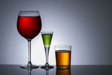 Three Colors of alcohol in glass