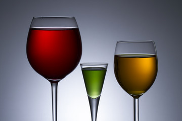 Three Colors of alcohol in glass