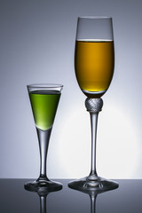 Green cocktail and white wine