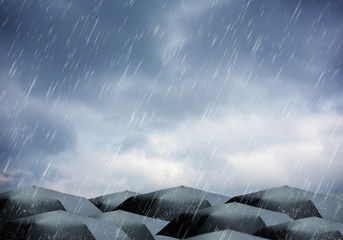 Umbrellas under rain and thunderstorm