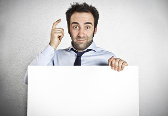 Man holding an empty white board