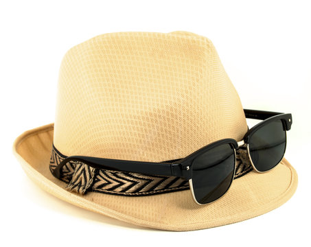 Hat And Sunglasses Isolated On A White Background