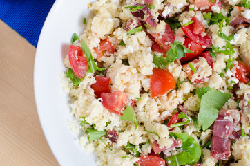 couscous with tomatoes and arugula