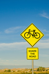 Bicycle Safety Warning Sign against Blue Sky