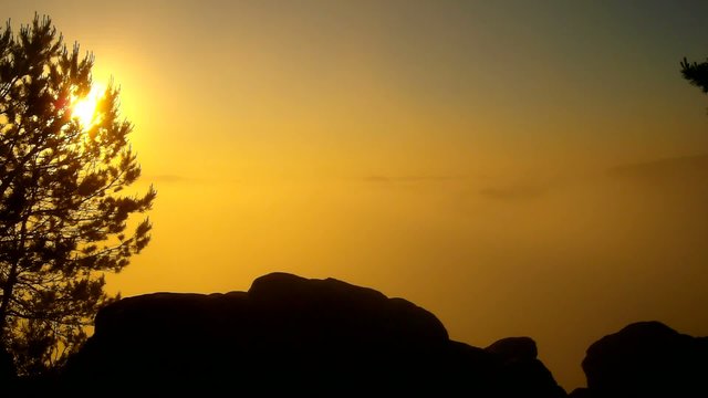 Hot spring misty sunrise in a beautiful sanstone rocky park.