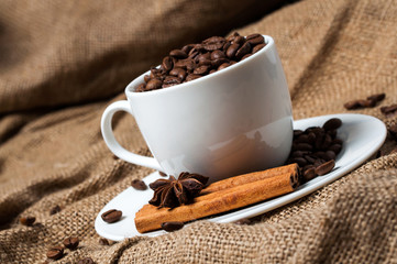 Coffee beans and coffee cup