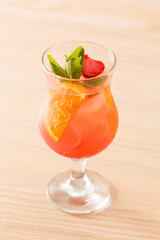 cocktail with orange and strawberry