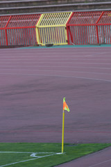 red corner flag on a soccer field