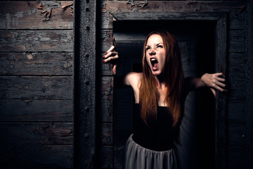 a young redhead girl shouting