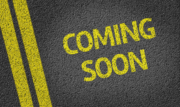 Coming Soon written on the road