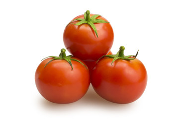 A few tomatoes on white background