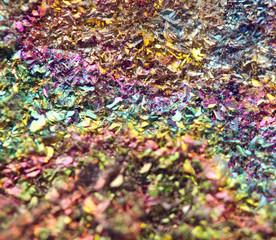 Fantastic background, magic of a stone, rainbow in metal rock