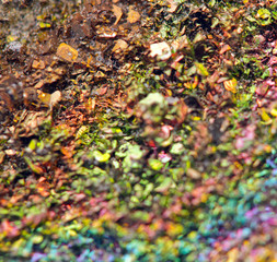 Fantastic background, magic of a stone, rainbow in metal rock