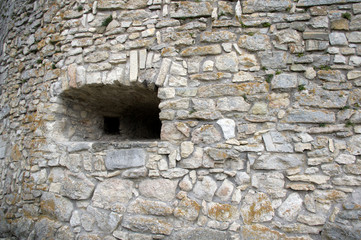 Fototapeta na wymiar Wall from old stones, stone wall texture