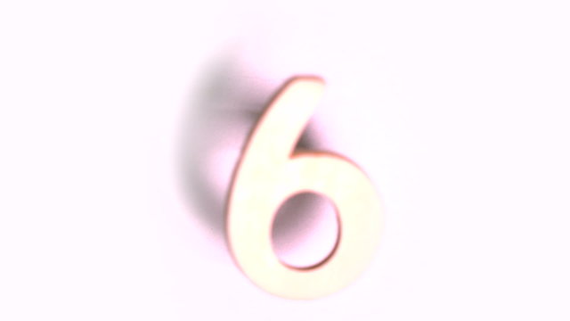 The number 6 rising on white background