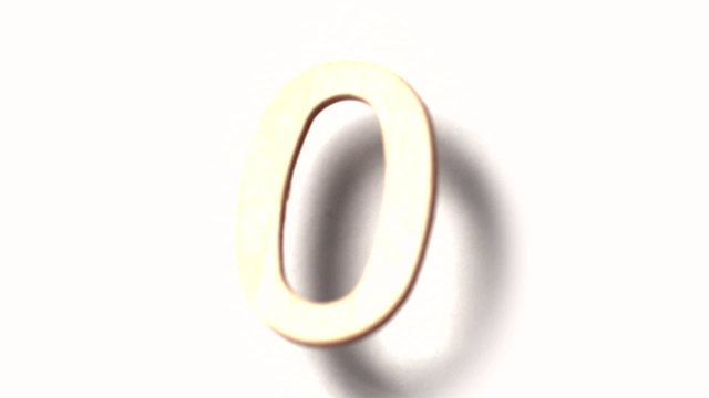 The number 0 rising on white background