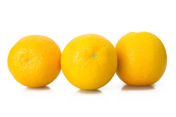 Three oranges on white background