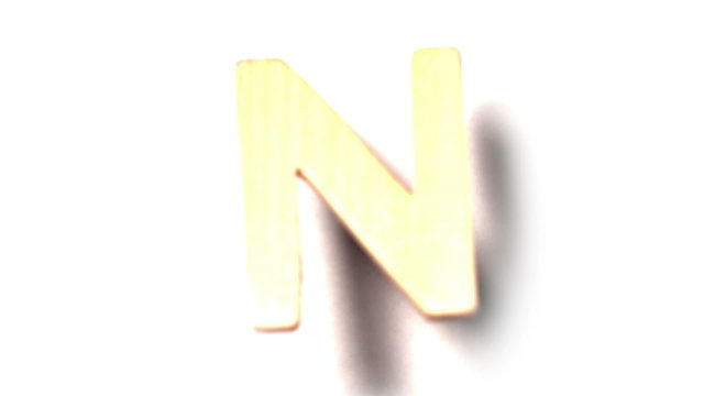 The letter n rising on white background