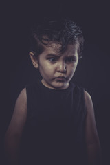 boy with slicked-back hair, funny and expressive