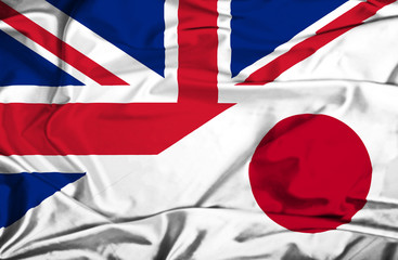 Waving flag of Japan and UK - 65480336