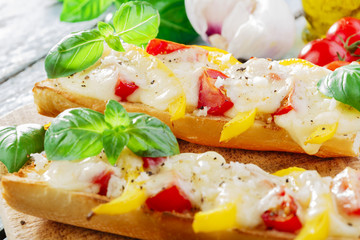 Bruschetta with tomatoes and bell peppers mozzarella