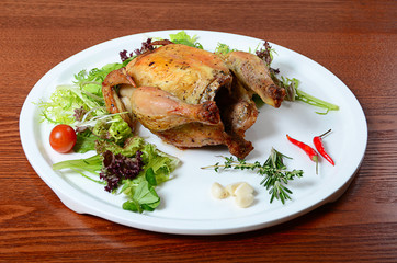 The baked hen with salad