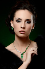 The beautiful woman in expensive pendant
