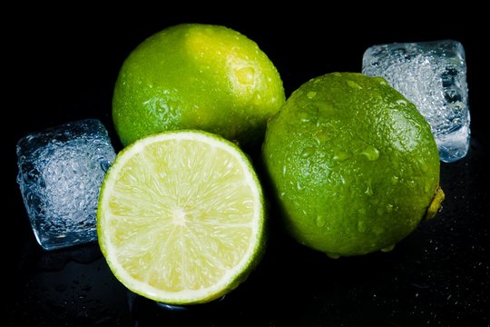 close-up of fresh lime with ice cubes