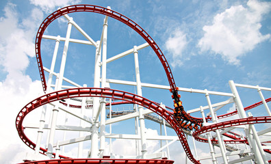 Rollercoaster against blue sky.